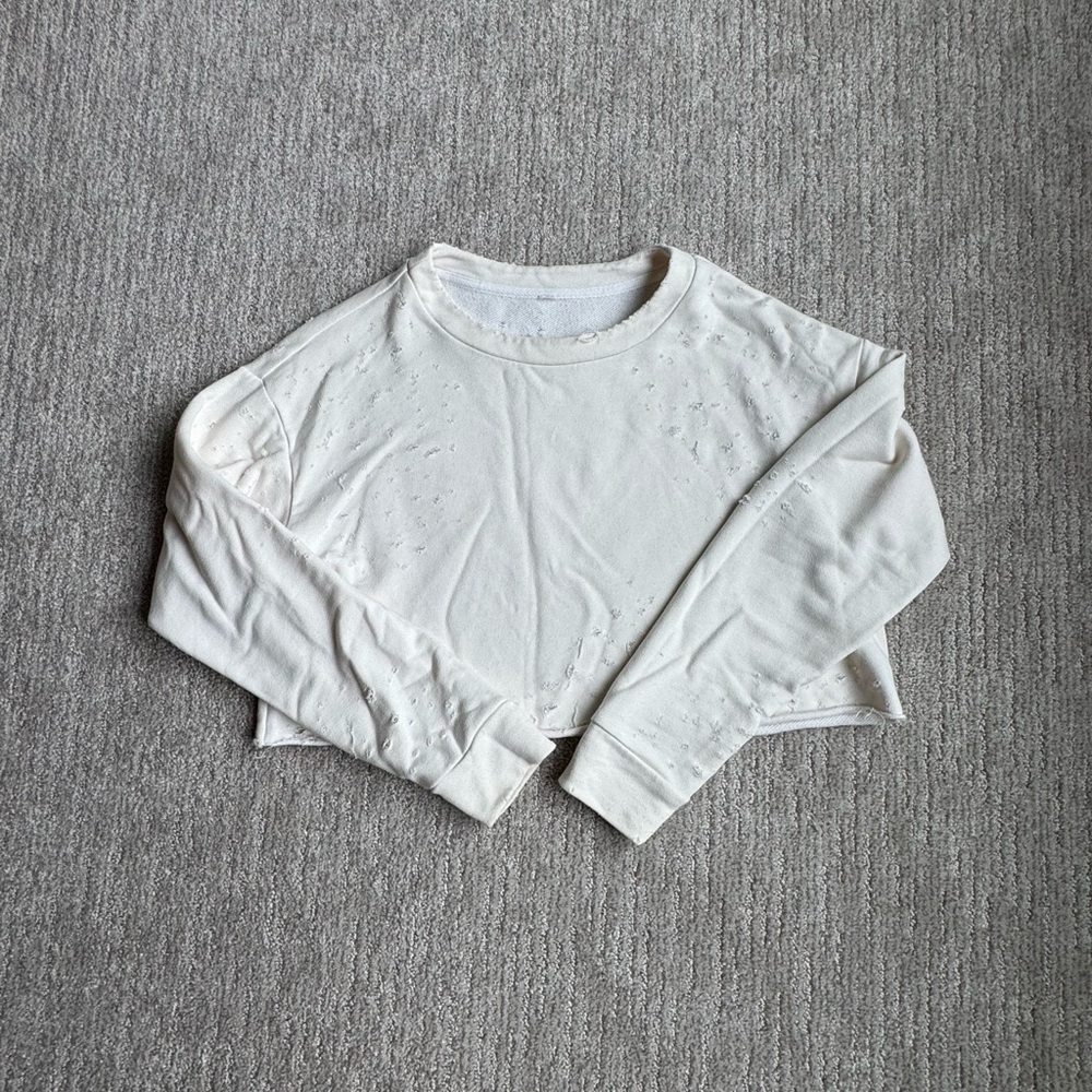 Alo distressed cream pullover top
